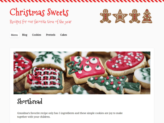 The theme is white and red with Christmas cookie decorations in the header. The font for the site title and headings is a curly, cursive font.